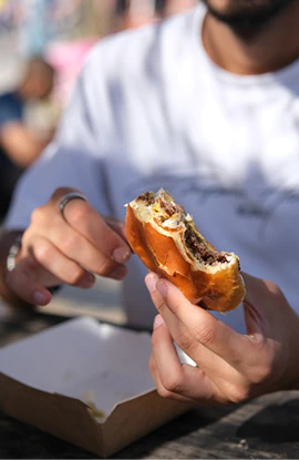 Burger being eaten outside